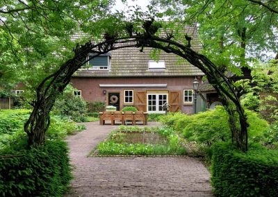 Achtertuin-boog